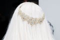 Wedding tiara diadem on the head of the bride head with blond ha