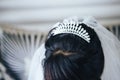 Wedding tiara diadem on the head of the bride. Close-up