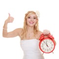 Wedding. Time to get married. Bride with alarm clock. Royalty Free Stock Photo