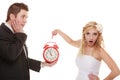 Wedding. Time to get married. Bride groom with clock. Royalty Free Stock Photo