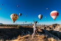 Wedding travel. Honeymoon trip. Couple in love among balloons. A guy proposes to a girl. Couple in love in Cappadocia. Couple in