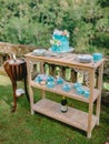 Wedding turquoise cake with flowers and gifts