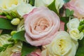 Wedding, Valentine`s day. Beautiful delicate wedding bouquet white and pink roses, wedding rings of the bride and groom Royalty Free Stock Photo