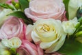 Wedding, Valentine`s day. Beautiful delicate wedding bouquet white and pink roses, wedding rings of the bride and groom Royalty Free Stock Photo