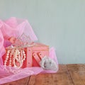 Wedding vintage crown of bride, pearls and pink veil. wedding concept. selective focus. vintage filtered