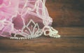 Wedding vintage crown of bride, pearls and pink veil. wedding concept. vintage filtered and toned image