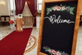 Wedding welcome board with space for text. rustic wooden wall wi