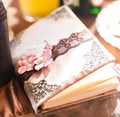 Wedding wish book decorated with flowers and lace Royalty Free Stock Photo