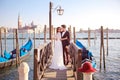 Wedding. A young couple riding a gondola in Venice. Italy Royalty Free Stock Photo