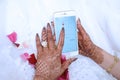 Weddinge morocco.White Bridal details-Women hand with red henna