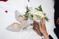 Weddinge morocco.White Bridal details-Women hand with red henna