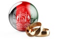 Weddings in Afghanistan concept. Wedding rings with Afghan flag. 3D rendering Royalty Free Stock Photo