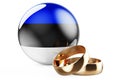 Weddings in Estonia concept. Wedding rings with Estonian flag. 3D rendering Royalty Free Stock Photo