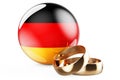 Weddings in Germany concept. Wedding rings with German flag. 3D rendering Royalty Free Stock Photo