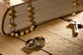 Weddings rings, bible and prayer beads