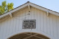 The Weddle Bridge, a covered bridge spanning Ames Creek in Sweet Home, Oregon. Plaque and sign Royalty Free Stock Photo