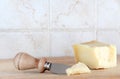 A wedge of parmigiano, with knife