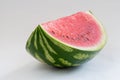 Wedge of watermelon with seeds isolated on white background