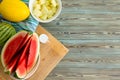 Wedges of sliced juicy watermelon on picnic table