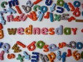 Wednesday banner with colorful lower case letters