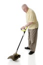 Weed Whacking Senior Royalty Free Stock Photo
