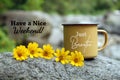 Just breathe. Have a nice weekend. With cup of tea or coffee and yellow tiny flowers decoration on the stone. Royalty Free Stock Photo