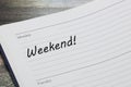 Weekend diary reminder appointment open on desk