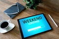 Weekend loading status bar message on device screen. Royalty Free Stock Photo