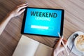 Weekend loading status bar message on device screen. Royalty Free Stock Photo