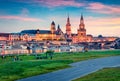 Weekend party on the shore of Elbe river with Academy of Fine Arts and Baroque church Frauenkirche cathedral on background. Wonde