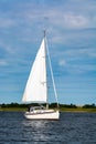 Weekend sailing on small jacht boat on riviers and canals in South Holland, Kaag, Netherlands Royalty Free Stock Photo