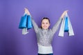 Weekend sale. Happy child. Little girl with gifts. Small girl with shopping bags. Kid fashion. shop assistant with Royalty Free Stock Photo