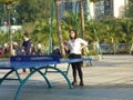 Shenzhen, China: young women are playing table tennis