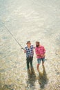 Weekends made for fishing. Male hobby. Fisher fishing equipment. United with nature. Man fisherman catches a fish. Hobby Royalty Free Stock Photo