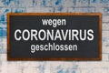 Wegen Coronavirus geschlossen is German and means closed due to coronavirus