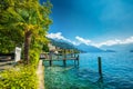 Village Weggis, lake Lucerne Vierwaldstatersee, Rigi mountain and Swiss Alps in the background near famous Lucerne Luzern city