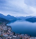 Weggis town, Switzerland. Lake Lucerne. Alps mountains in the snow. Aerial view Royalty Free Stock Photo