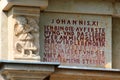 Weida, Germany - June 18, 2023: Entrance to Max Greil state school with the verse from the Bible, John XI