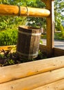 Weighing bucket over the well