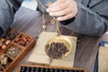 Weighing traditional Chinese medicine xiangfuzi