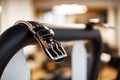Weight belt hanging on a gym apparatus in a fitness hall Royalty Free Stock Photo