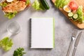 Weight loss concept, calories counting, diet, food control and calorie counter, diet plan. Notebook, food, salad, egg Royalty Free Stock Photo