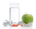 Weight loss concept with tape measure organic green apple Royalty Free Stock Photo