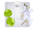 Weight loss concept, white floor scale, green apples and white orchid top view