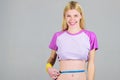 Weight loss. Fitness and health. Female slim waist belly and tape measure. Athlete fitness coach training. Trying to Royalty Free Stock Photo