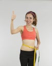 Weight loss woman thumbs up