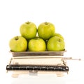 Weight scale fresh apples isolated over white background Royalty Free Stock Photo