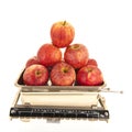 Weight scale fresh apples isolated over white background Royalty Free Stock Photo