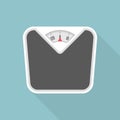 Weight scale with long shadow. Royalty Free Stock Photo