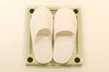 Weight Scale with White Hotel Slippers Royalty Free Stock Photo